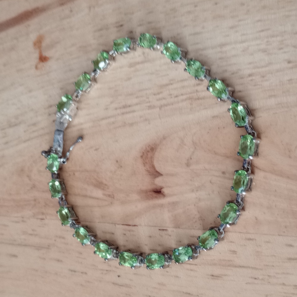 AUGUST BIRTHSTONE.                 Peridot sterling silver tennis bracelet